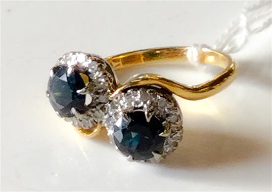 18ct gold sapphire and diamond crossover ring(-)